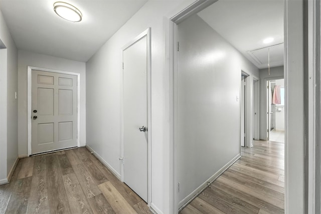 8503 Leader St, Houston, TX 77036 - hall featuring attic access and light wood-style flooring
