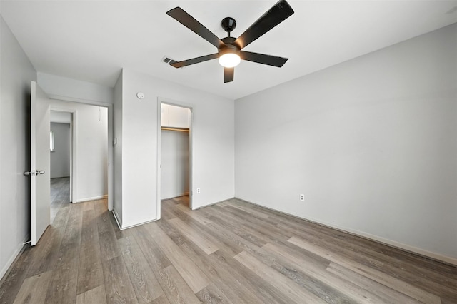 8503 Leader St, Houston, TX 77036 - unfurnished bedroom with light wood-type flooring, a closet, and ceiling fan