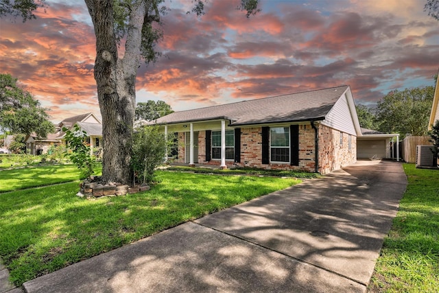 8503 Leader St, Houston, TX 77036 - ranch-style home featuring brick siding, a yard, and roof with shingles
