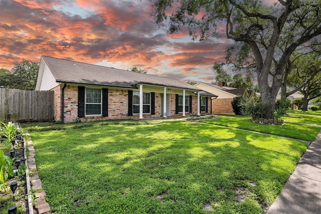 8503 Leader St, Houston, TX 77036 - ranch-style home with brick siding, a porch, and a shingled roof