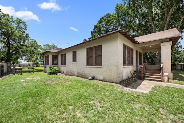 600 Brazos St, Glidden, TX 78943 - view of property exterior featuring stucco siding