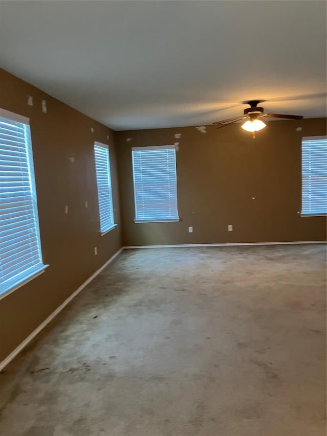 509 Estes Park, Taylor, TX 76574 - carpeted spare room featuring ceiling fan and baseboards