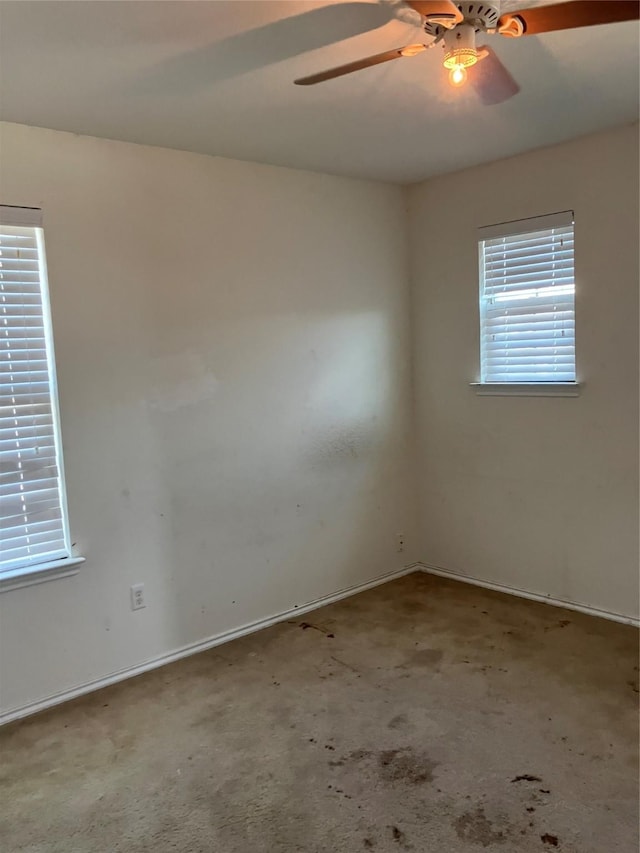 509 Estes Park, Taylor, TX 76574 - spare room with plenty of natural light, a ceiling fan, and carpet floors