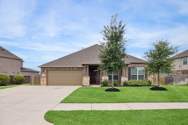 1502 Trails Of Katy Ln, Katy, TX 77494 - view of front of house with driveway, a garage, roof with shingles, and stone siding