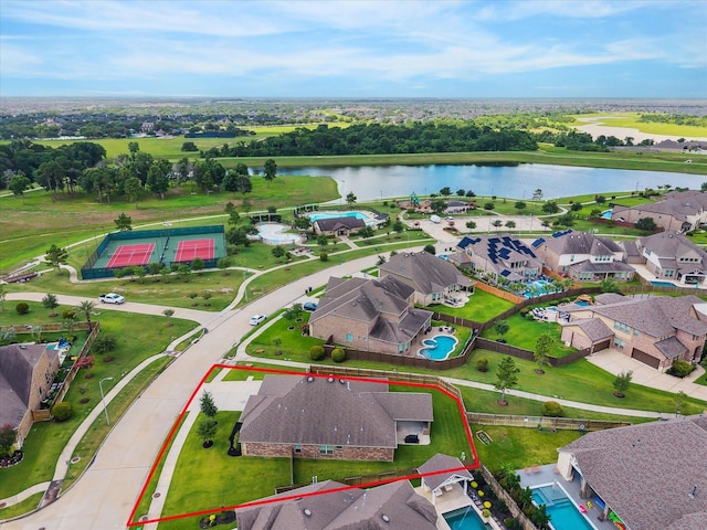 1502 Trails Of Katy Ln, Katy, TX 77494 - aerial view of residential area with a nearby body of water and property parcel outlined