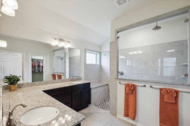 1502 Trails Of Katy Ln, Katy, TX 77494 - full bath featuring tile patterned flooring, double vanity, a walk in shower, and a spacious closet