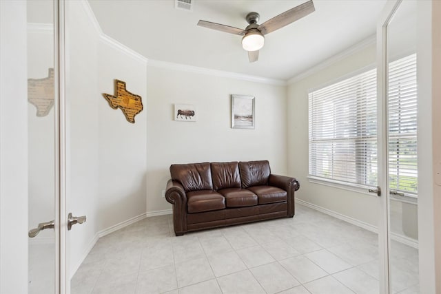 1502 Trails Of Katy Ln, Katy, TX 77494 - living area with ceiling fan, ornamental molding, and light tile patterned flooring