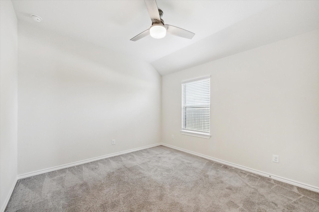 1502 Trails Of Katy Ln, Katy, TX 77494 - spare room with ceiling fan, carpet floors, a smoke detector, and vaulted ceiling