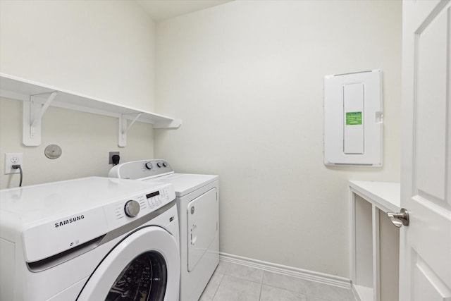 1502 Trails Of Katy Ln, Katy, TX 77494 - laundry room featuring electric panel, separate washer and dryer, and light tile patterned flooring