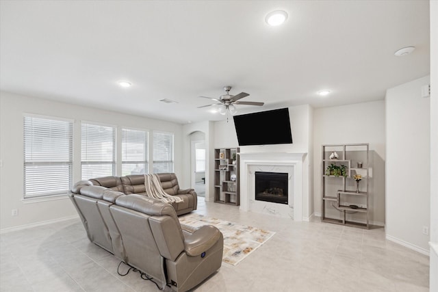 1502 Trails Of Katy Ln, Katy, TX 77494 - living room featuring a ceiling fan, plenty of natural light, a fireplace, and recessed lighting
