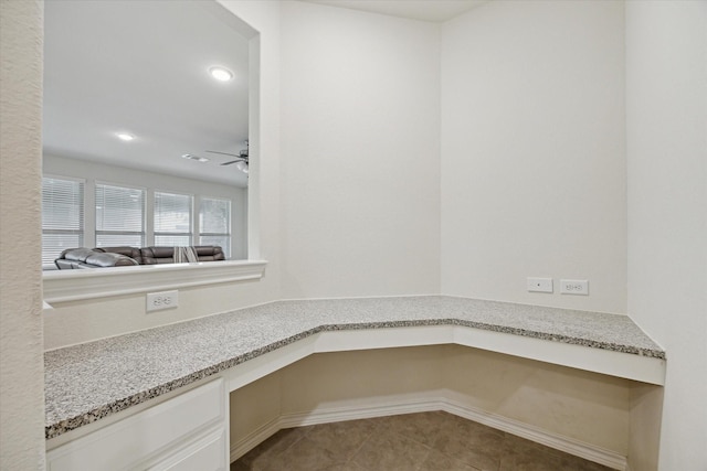 1502 Trails Of Katy Ln, Katy, TX 77494 - unfurnished office featuring built in desk, tile patterned flooring, ceiling fan, and recessed lighting