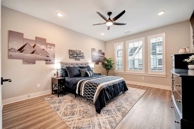 3615 Weston Manor Ln, Houston, TX 77055 - bedroom with wood finished floors, recessed lighting, and ceiling fan