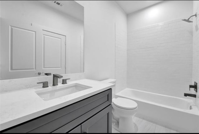 209 Edgewood St Unit C, Houston, TX 77011 - full bath featuring vanity, shower / bathtub combination, and marble finish flooring