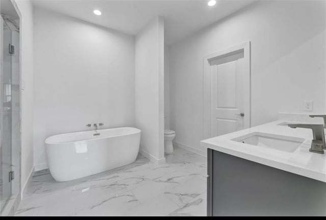 209 Edgewood St Unit C, Houston, TX 77011 - bathroom featuring recessed lighting, a freestanding tub, double vanity, marble look tiles, and a stall shower