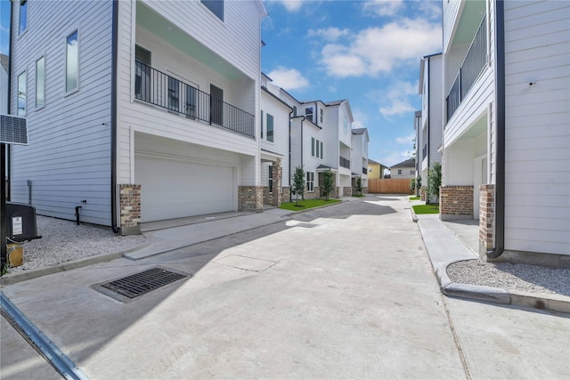 209 Edgewood St Unit C, Houston, TX 77011 - view of concrete road featuring a residential view