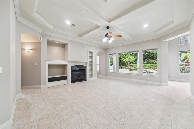 5215 Eagle Pointe Ct, Sugar Land, TX 77479 - unfurnished living room with arched walkways, healthy amount of natural light, a ceiling fan, light tile patterned flooring, and crown molding