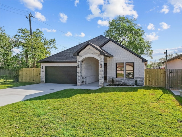 2235 Minnesota St, Houston, TX 77034 - french provincial home with brick siding, driveway, a garage, and roof with shingles