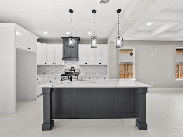 2235 Minnesota St, Houston, TX 77034 - kitchen featuring backsplash, white cabinets, recessed lighting, light stone countertops, and hanging light fixtures