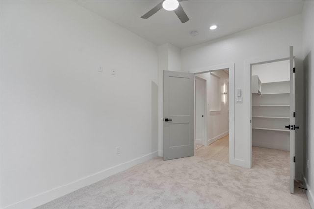 4433 Phlox St, Houston, TX 77051 - unfurnished bedroom featuring a walk in closet, carpet, a closet, a ceiling fan, and recessed lighting