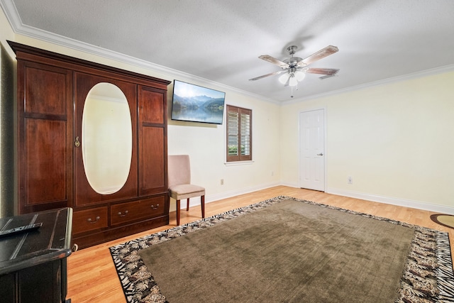 150 Greenbriar Dr, Montgomery, TX 77356 - foyer entrance featuring light wood-type flooring, crown molding, and ceiling fan