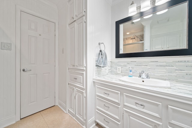 150 Greenbriar Dr, Montgomery, TX 77356 - bathroom featuring vanity, tile patterned floors, backsplash, ornamental molding, and a shower