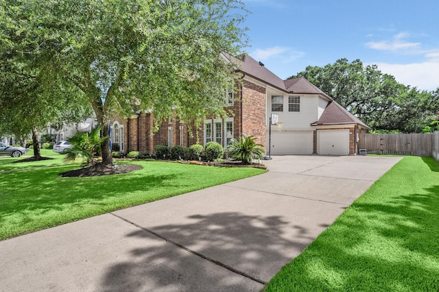 18718 Glenn Haven Estates Dr, Spring, TX 77379 - view of front of home featuring brick siding, driveway, and roof with shingles