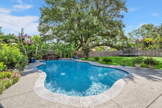 18718 Glenn Haven Estates Dr, Spring, TX 77379 - view of pool featuring a trampoline and a fenced backyard