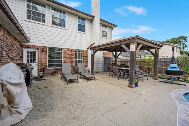 18718 Glenn Haven Estates Dr, Spring, TX 77379 - view of patio with a gazebo and outdoor dining area