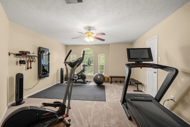 18718 Glenn Haven Estates Dr, Spring, TX 77379 - workout room with a ceiling fan, carpet floors, and a textured ceiling