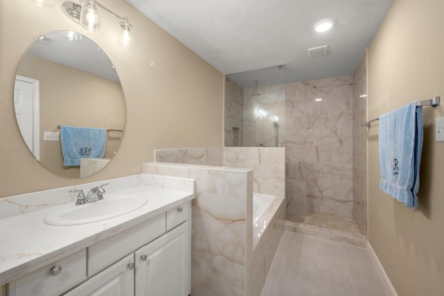 18718 Glenn Haven Estates Dr, Spring, TX 77379 - bathroom with vanity, a marble finish shower, tile patterned floors, and a tub with marble appearance