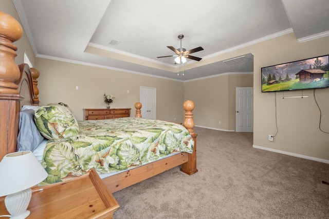 18718 Glenn Haven Estates Dr, Spring, TX 77379 - bedroom featuring carpet, a tray ceiling, crown molding, and ceiling fan