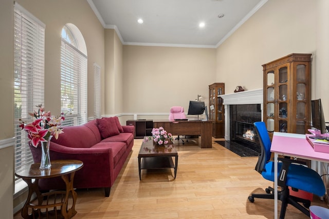 18718 Glenn Haven Estates Dr, Spring, TX 77379 - office with a high end fireplace, wood finished floors, ornamental molding, and recessed lighting