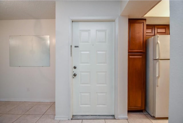 2818 S Bartell Dr S Unit 6, Houston, TX 77054 - foyer entrance featuring light tile patterned floors