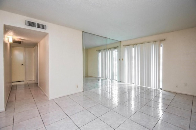 2818 S Bartell Dr S Unit 6, Houston, TX 77054 - unfurnished room with light tile patterned floors