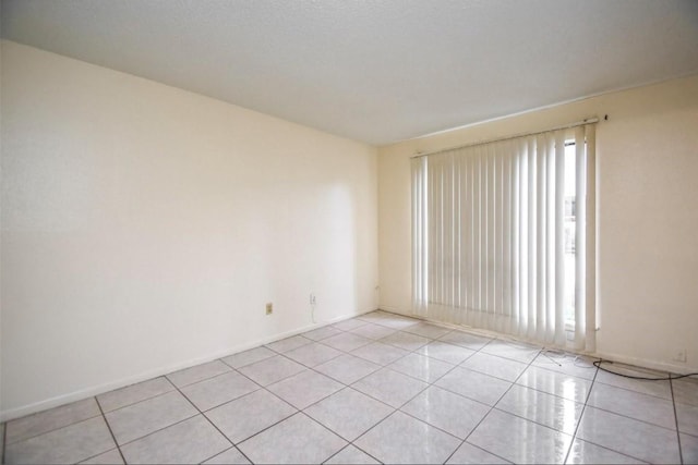 2818 S Bartell Dr S Unit 6, Houston, TX 77054 - spare room with light tile patterned floors