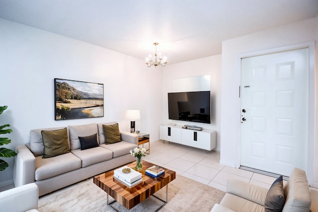 2818 S Bartell Dr S Unit 6, Houston, TX 77054 - living room featuring a chandelier and light tile patterned flooring