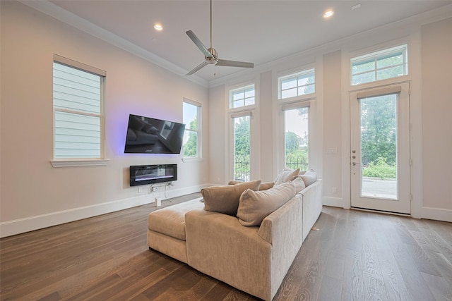 5308 S Capitol St, Houston, TX 77023 - living area featuring crown molding, dark wood-style floors, recessed lighting, and ceiling fan