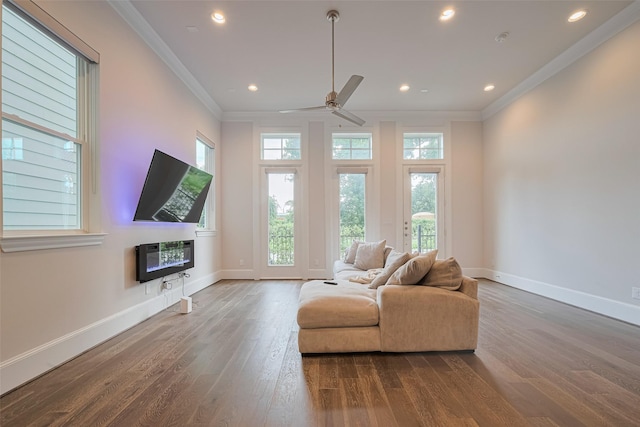 5308 S Capitol St, Houston, TX 77023 - living area featuring ornamental molding, wood finished floors, ceiling fan, recessed lighting, and heating unit