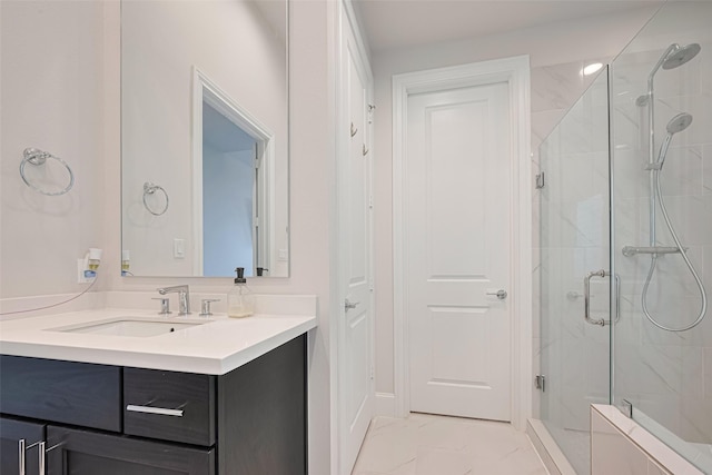 5308 S Capitol St, Houston, TX 77023 - bathroom with a stall shower, vanity, and marble finish flooring