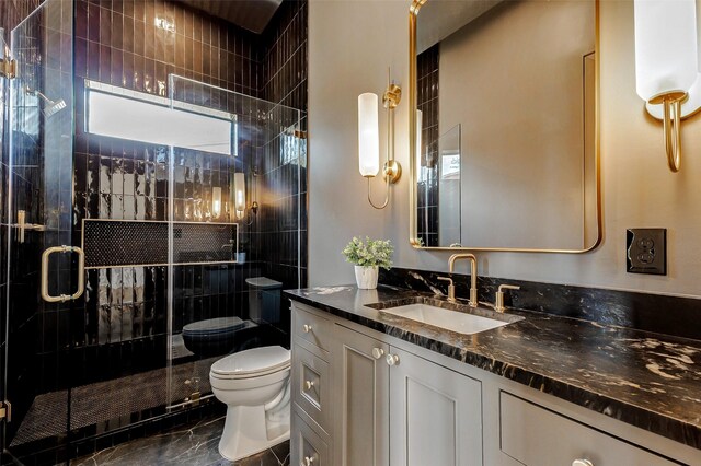 6911 Hartland Ave, Houston, TX 77055 - bathroom with a shower stall, vanity, and marble finish floors