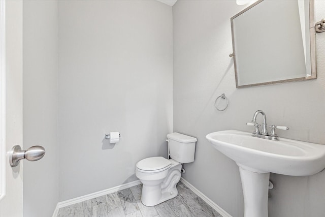 2551 Goldeneye Ln, League City, TX 77573 - bathroom with toilet and marble finish floors