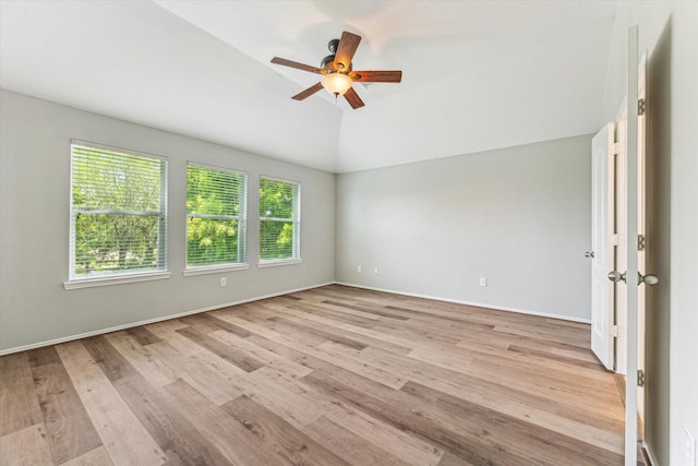 2551 Goldeneye Ln, League City, TX 77573 - unfurnished room with ceiling fan, light wood-style flooring, and vaulted ceiling