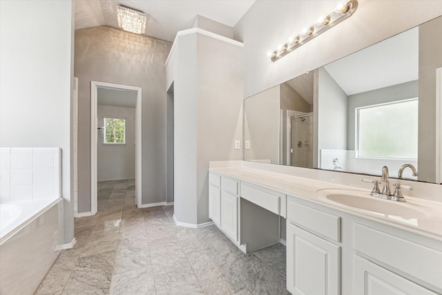 2551 Goldeneye Ln, League City, TX 77573 - bathroom with vanity, a garden tub, an enclosed shower, and marble look tile flooring