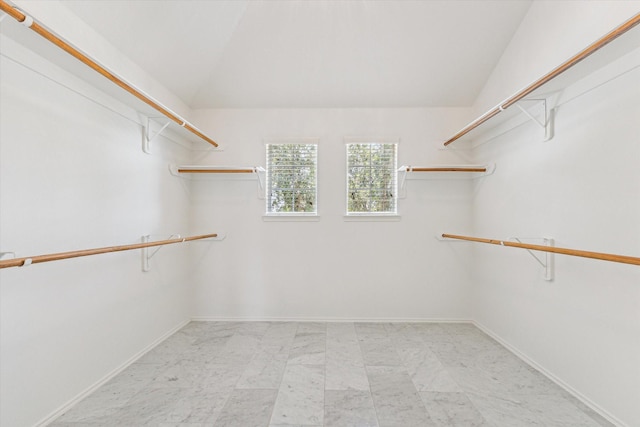 2551 Goldeneye Ln, League City, TX 77573 - spacious closet featuring vaulted ceiling