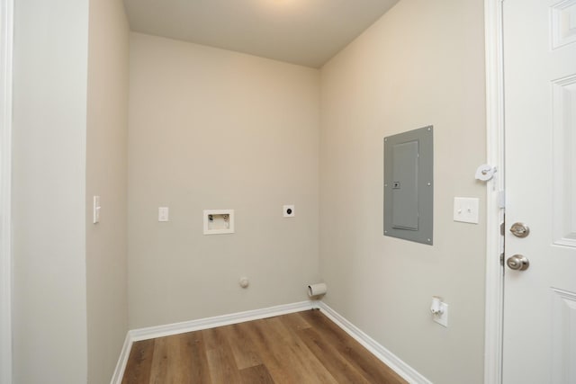1440 Shepherd St, Hempstead, TX 77445 - washroom featuring electric panel, hookup for an electric dryer, washer hookup, wood finished floors, and gas dryer hookup