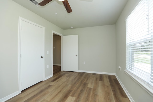 1440 Shepherd St, Hempstead, TX 77445 - unfurnished bedroom featuring wood finished floors and ceiling fan