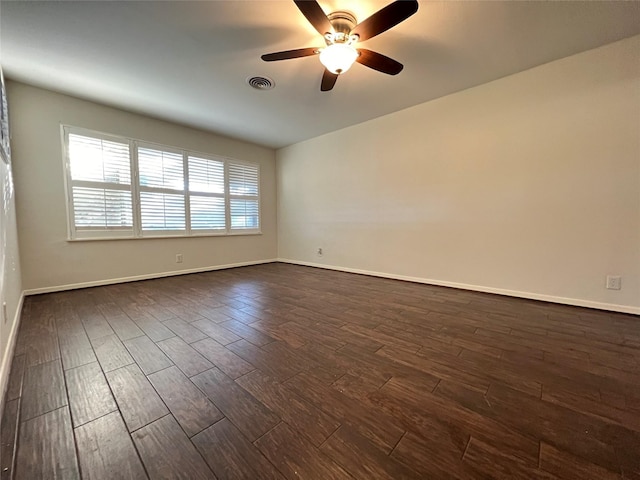 4602 Redstart St, Houston, TX 77035 - empty room featuring a ceiling fan and dark wood-style floors