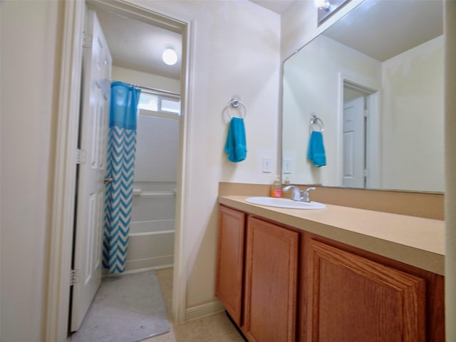 21603 Micheala Way, Humble, TX 77338 - bathroom featuring vanity, tile patterned floors, and shower / tub combo