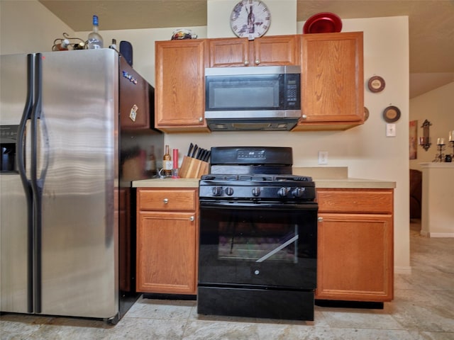 21603 Micheala Way, Humble, TX 77338 - kitchen with stainless steel appliances and light countertops