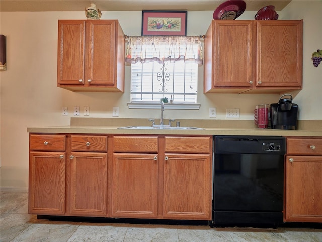 21603 Micheala Way, Humble, TX 77338 - kitchen featuring black dishwasher, light countertops, and brown cabinetry